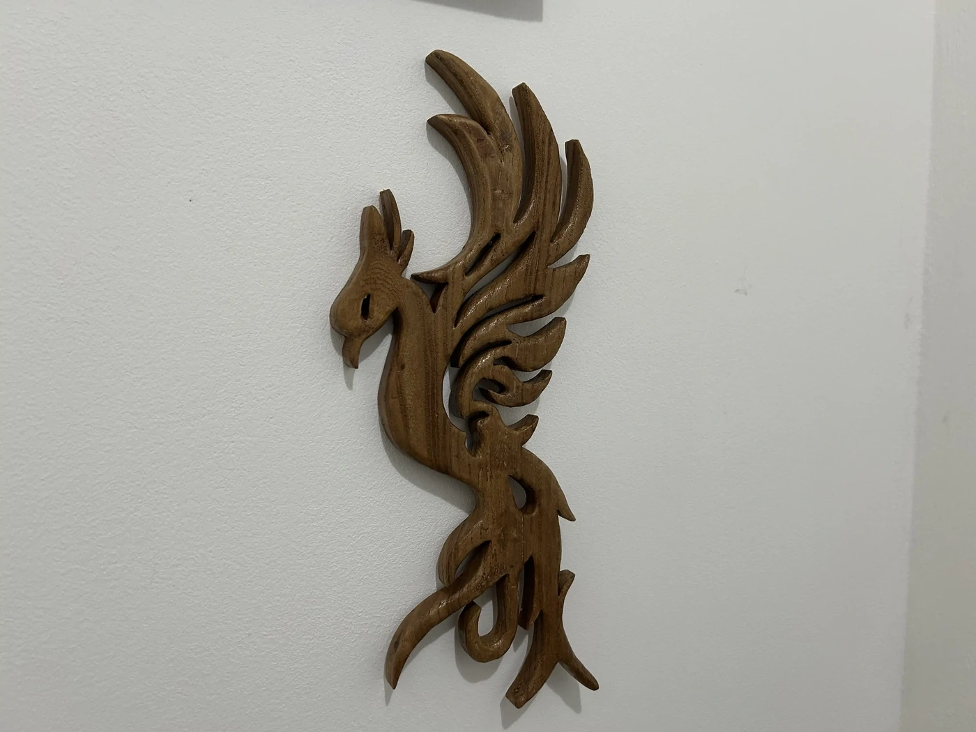 Le phénix, symbole de la renaissance - En bois de loupe d’orme, bois très rare - 27cm de haut - Finition fond dur et vitrificateur - 40€